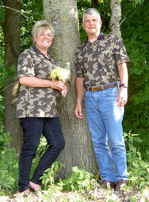 This isn't a deer hunting photo, but Scott and Lori obviously love Winona Camo to wear these fabric Winona shirts on their Wedding day, sorry we don't carry the fabric Winona products - just the Winona Knit Camo!