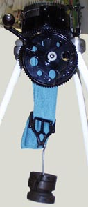 CSM attach a Buckle and Weight to hold the yarn in the hooks of the Latch Needles