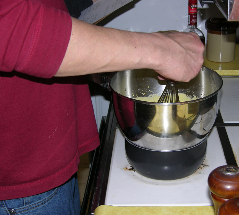 get a double boiler of water boiling: or if you don’t have a double boiler- like Mom – use a small kettle of water, and place a metal bowl on top of it (must be metal).  This is for the sauce.