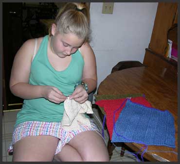 Little Knitter Learns the Latch Tool Bind Off Knitting Technique