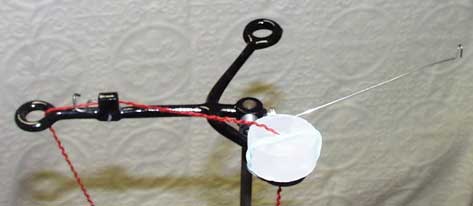 Fig 4. Yarn Tension Unit for a CSM with Parifin wax attached to aid with yarn flow