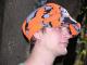 A Knit Winona Camo™ Ridge Runner Hat ~ color R: orange / black / grey